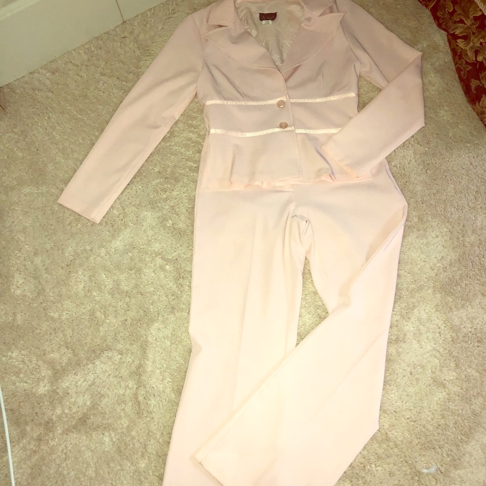 Pink pants suit